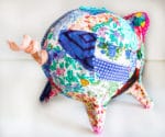 Patchwork-Sparschwein aus Altpapier und Stoffresten