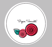 Kreative Papierkunst mit spiralförmigen Rosen und Blättern, handgefertigt, für kreative Bastelprojekte und Dekorationen im Bereich Handmade Kultur.