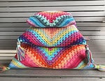 „Boho Dreams“ Häkelkissen mit Quasten im Mustermix