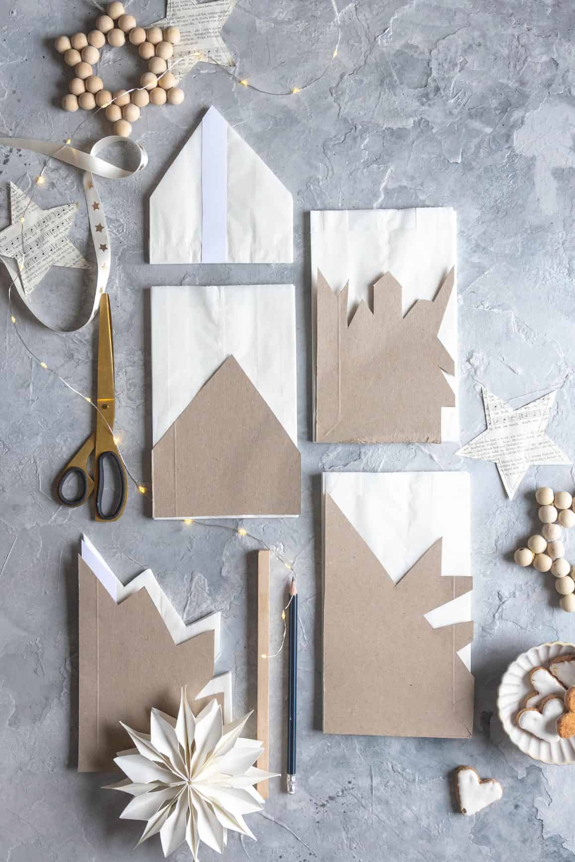 Weihnachtsdeko aus Butterbrottüten basteln – Anleitung für Sterne und Schneeflocken