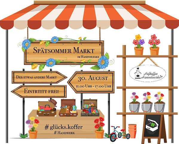 Bunte Marktstände beim Spätsommer Markt im Hofkaffee Hanenhueske mit Blumen, Schildern und Kinderfahrrad.