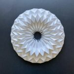 Falttechniken: Eine Sonne aus Papier