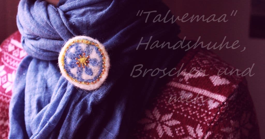 Wollen handgemachte Handschuhe und Broschen